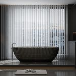 grey oval transparent resin bathtub with textured exterior