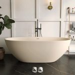 beige oval stone resin bathtub