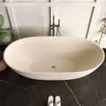 beige oval stone resin bathtub